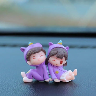 1 Set (2 Pcs) Adorable Couple Miniature Figurines in Purple Unicorn Outfits | Cute Boy & Girl Sitting Pose Showpiece for Car Dashboard, Home Decor, Gifting, Birthday & Anniversary