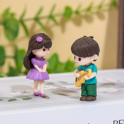 2 Set (4 Pcs) Romantic Couple Miniature Figurines | Boy Playing Guitar & Girl in Purple Dress | Cute Showpiece for Home Decor,Cake Topper, Anniversary & Romantic Decor (Resin)