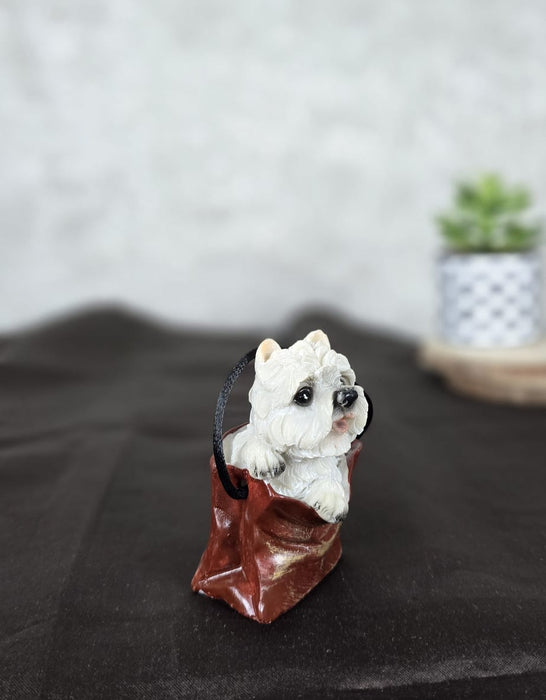 1 pc Cute Miniature Dog in Bag Poly Resin Statue with Hanging, Decorative Piece for Living Room, Bed Room, Table top, Restaurant, cafes, Gifting, Birthday( Pack of 1)